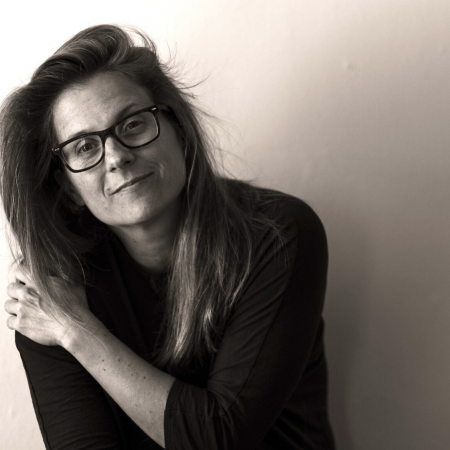Studio portrait of wedding reportage photographer Emily Renier of the United Kingdom UK wedding reportage photos by Emily Renier