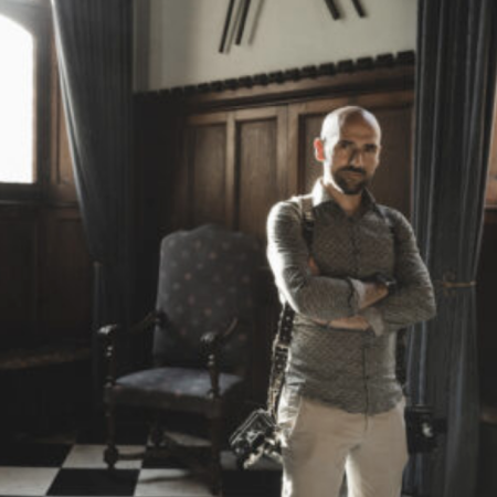 Portrait of Giuseppe Bana – Wedding Photographer in Bergamo, Lombardy, Italy Indoor portrait of Giuseppe Bana, a wedding photographer based in Bergamo, Lombardy, Italy, known for capturing authentic and heartfelt moments on couples’ special days.