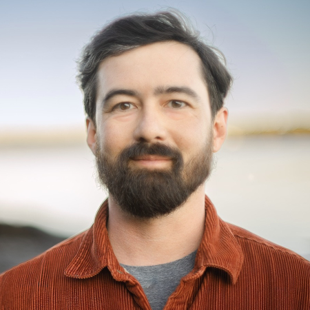 Professional headshot of Ned Warner, Portland, ME documentary wedding photographer.