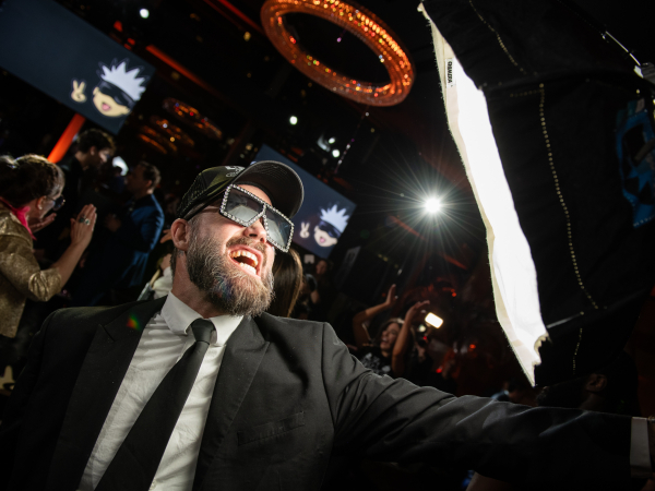 Soft box party scene portrait of wedding photographer Joey Curry of the USA WPJA