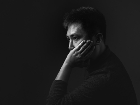 Black and white studio portrait of He Ying Ji, Zhanjiang-based WPJA wedding photographer from Guangdong, China.