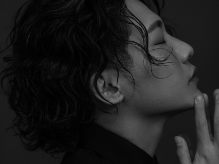 Black and white studio portrait of wedding photographer Pao Cai from Taiyuan, Shanxi, China