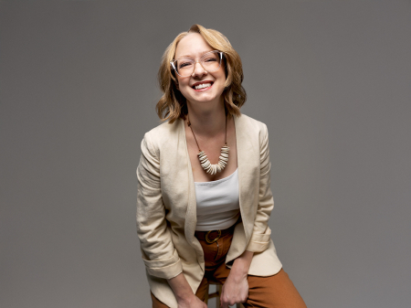 Studio portrait of wedding and elopement photographer Erica Hilliard