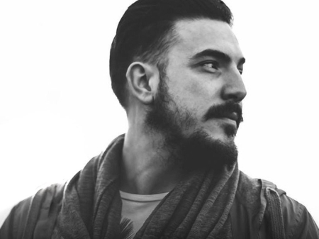 BW Portrait of Isaac Occam, Wedding Photographer in Cordoba, Spain Black-and-white profile portrait of Isaac Occam, a wedding photographer based in Cordoba, Spain, known for capturing authentic stories and meaningful details.