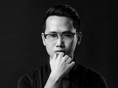 Studioportret van Da Nang-huwelijksfotograaf Lucas Tran van Vietnam Da Nang huwelijksfotografie en schaken door Lucas Tran uit Vietnam