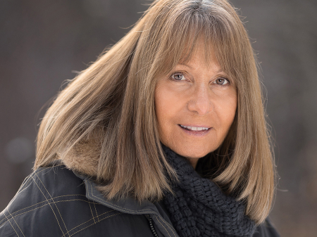 Lifestyle portrait of Vermont wedding photographer Sally Carpenter