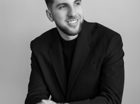 Professional portrait of Andrii Vernyi, a Chicago, Illinois-based WPJA wedding photographer, recognized for capturing authentic, memorable moments and documenting couples’ unique love stories with creativity and skill.