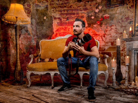 Studio portrait of Adrian Dumitru, an experienced wedding photographer based in Bucharest, Romania, and member of the Wedding Photojournalist Association.
