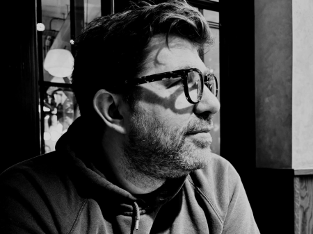 Black and white portrait of Bristol wedding photographer Oliver Holder