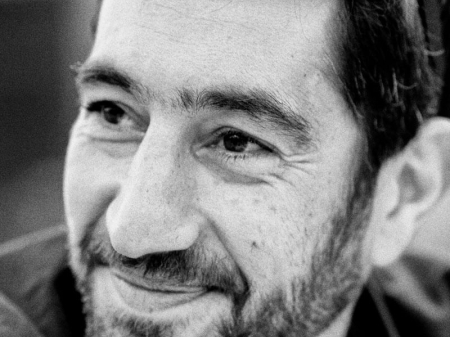 Black and white portrait of Michael Salis, documentary wedding photographer based in Paros, Greece