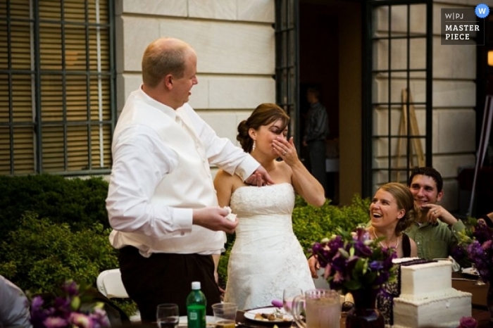 Photo by: <a href="https://www.wpja.com/contests/2008-q4/cake-cutting/94971">Andrea Bibeault - United States</a> Wedding Photographer Andrea Bibeault of Nebraska, United States
