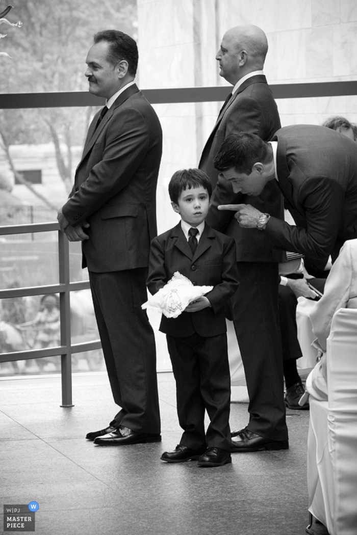 Photo by: <a href="https://www.wpja.com/contests/2011-q4-contest/ceremony/10th-place">Andrea Bibeault - United States</a> Wedding Photographer Andrea Bibeault of Nebraska, United States