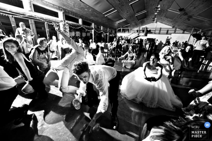 Photo by: <a href="https://www.wpja.com/contests/2012-q3-contest/dancing-action/973506">Anginet Page - United States</a> Wedding Photographer Anginet Page of Colorado, United States