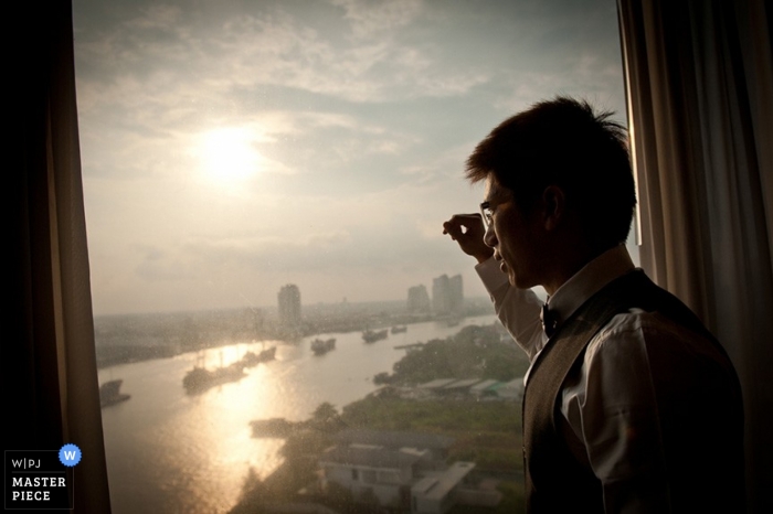 Photo by: <a href="https://www.wpja.com/contests/2012-q4-contest/creative-portrait-groom/1050376">Sopon Chienwittayakun - Thailand</a> Wedding Photographer Sopon Chienwittayakun of Bangkok, Thailand