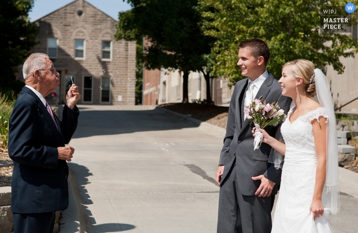 Photo by: <a href="https://www.wpja.com/contests/2012-q4-contest/ceremony/1104956">Andrea Bibeault - United States</a> Wedding Photographer Andrea Bibeault of Nebraska, United States