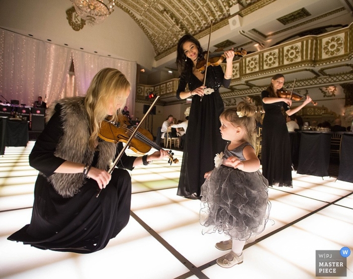 Chicago Wedding Photographer | Image contains: reception, girl, musicians, violins