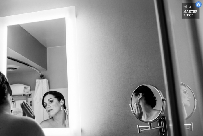 Documentary Wedding Photograph in Nova Scotia | Image contains: black, white, mirrors, reflection, getting ready