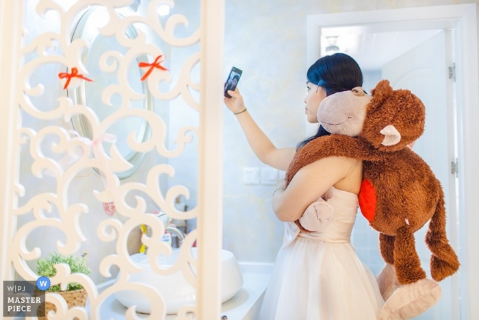 Photo by: <a href="https://www.wpja.com/contests/2014-q1-photography-contest/getting-ready/1397926">Fang Wan - China</a> Wedding Photographer Fang Wan of Shanghai, China