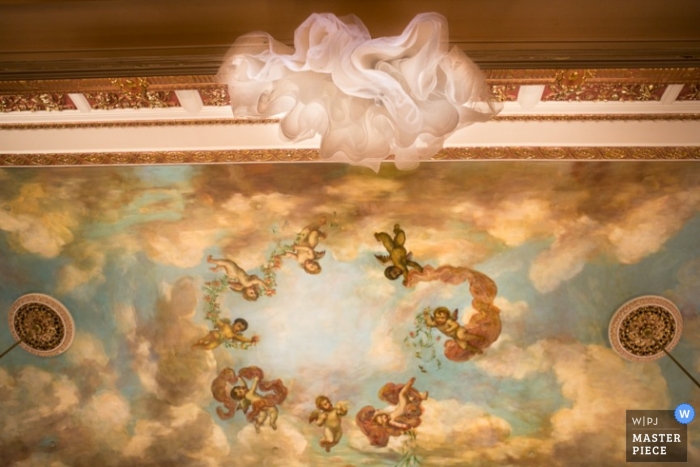 Wisconsin wedding photographer created this image of the cathedral ceiling where the wedding was taking place