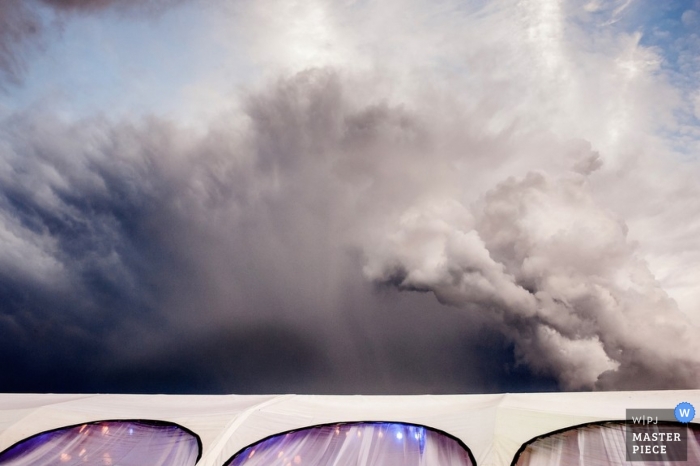 Photo by: <a href="https://www.wpja.com/contests/2014-q4-photography-contest/weather/1555231">Max Pell - Argentina</a> Santa Fe wedding photographer captured this beautiful photo of unique clouds over the wedding