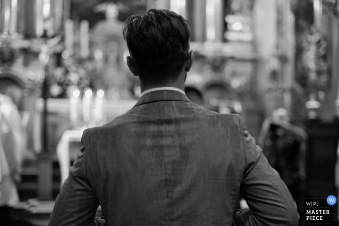 Photo by: <a href="https://www.wpja.com/contests/2014-q4-photography-contest/weather/1556506">Pawel Sarota - Poland</a> Malopolskie wedding photographer caught the rain speckled jacket of the groom in this black and white shot