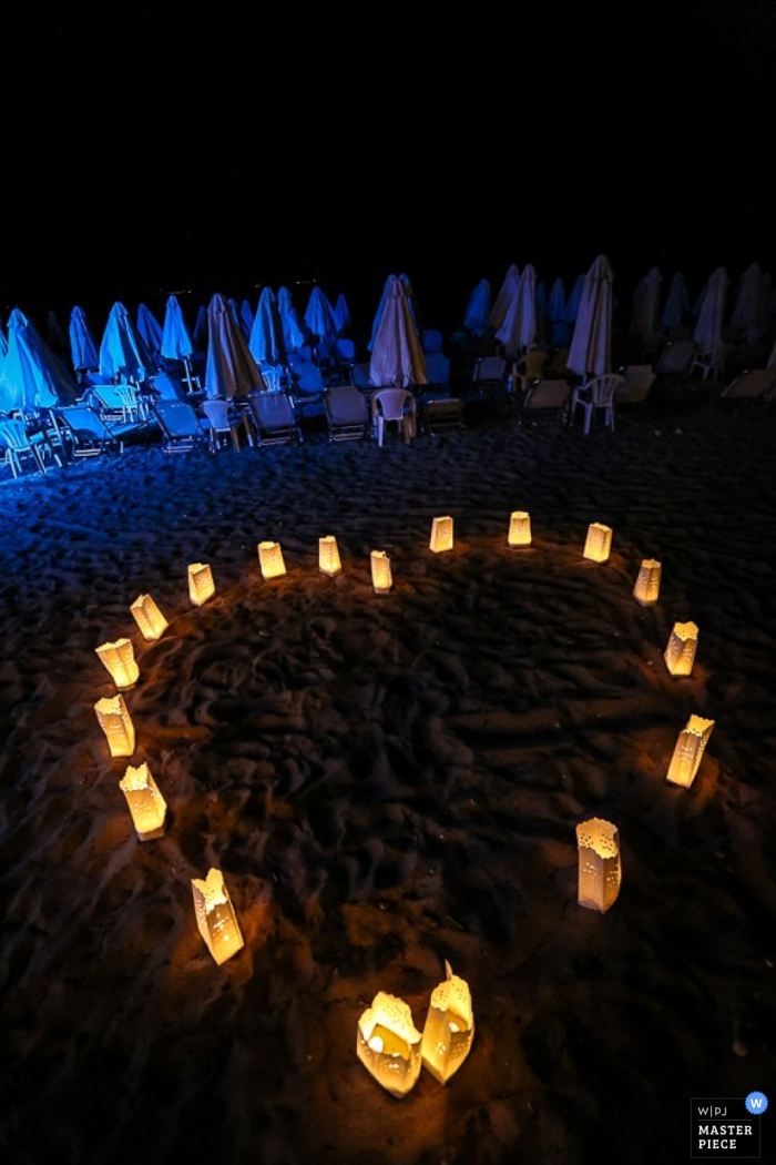 Santorini candles in the shape of a heart - South Aegean wedding photography