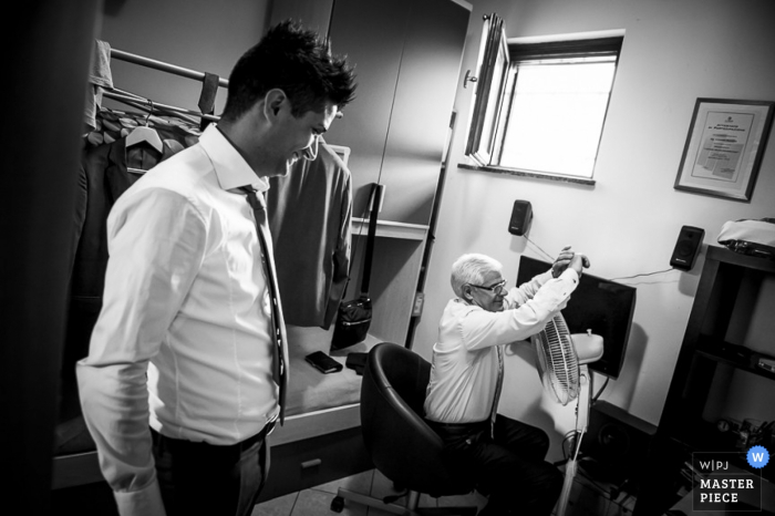 Photo by: <a href="https://www.wpja.com/contests/2015-q3-photography-contest/weather/1670046">Luigi Rota - Italy</a> Lecco groom getting ready for the wedding ceremony - Lombardy wedding photography