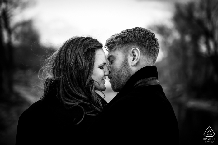 Photo by: <a href="https://www.wpja.com/photos/diamond-award-top-wedding-engagement-photographer/2175556">Jesse La Plante - United States Wedding Photographer</a> Colorado Engagement Photography portrait session in black-and-white. Kissing couple Photos.