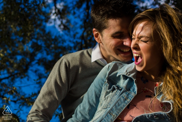 Alicante Engagement Photos. Love and laughter in this warmly lit portrait.