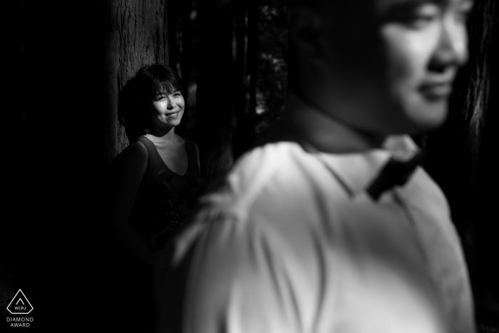 Victoria, Australia Black and white engagement photo of A couple with sunlight and shadows