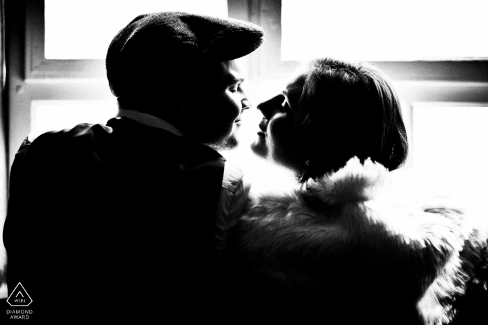 Photo by: <a href="https://www.wpja.com/photos/diamond-award-top-wedding-engagement-photographer/2198801">David Anton - Germany Wedding Photographer</a> Preparing for their wedding, a Baden-Wurttemberg couple kisses for their black-and-white engagement portraits