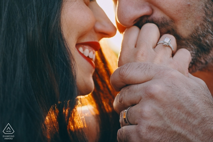 Photo by: <a href="https://www.wpja.com/photos/diamond-award-top-wedding-engagement-photographer/2201556">Kurt Vinion - Czech Republic Wedding Photographer</a> A very tight shot of this Czech Republic couple as he kisses the hand of his fiancée with a ring on it