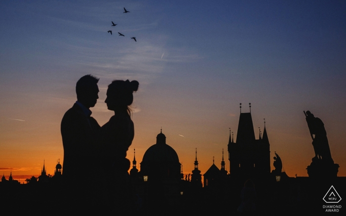 Photo by: <a href="https://www.wpja.com/photos/diamond-award-top-wedding-engagement-photographer/2245636">Kurt Vinion - Czech Republic Wedding Photographer</a> A sunrise engagement photo session on the Charles Bridge