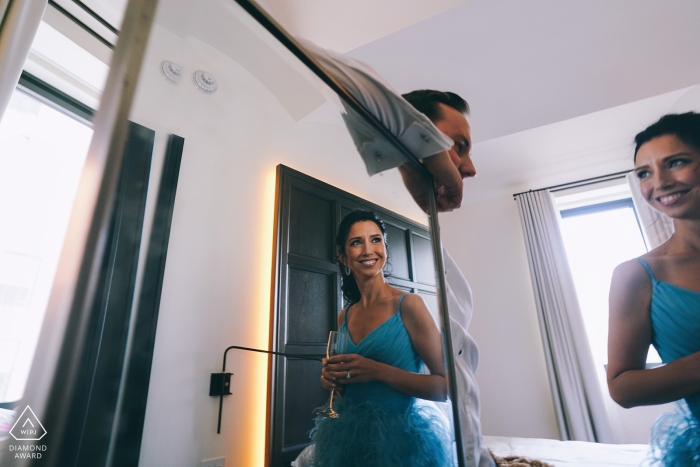 Indoor reflected pre-wedding engagement pictures of a couple | NYC portrait shoot