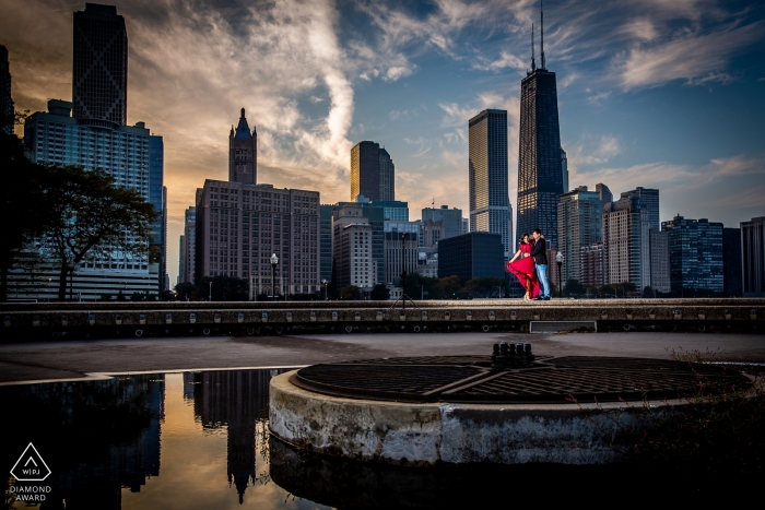 Photo by: <a href="https://www.wpja.com/photos/diamond-award-top-wedding-engagement-photographer/2320116">Victoria Sprung - Chicago Illinois Chicago engagement photos of a couple with the city skyline behind | IL photographer pre-wedding portrait session