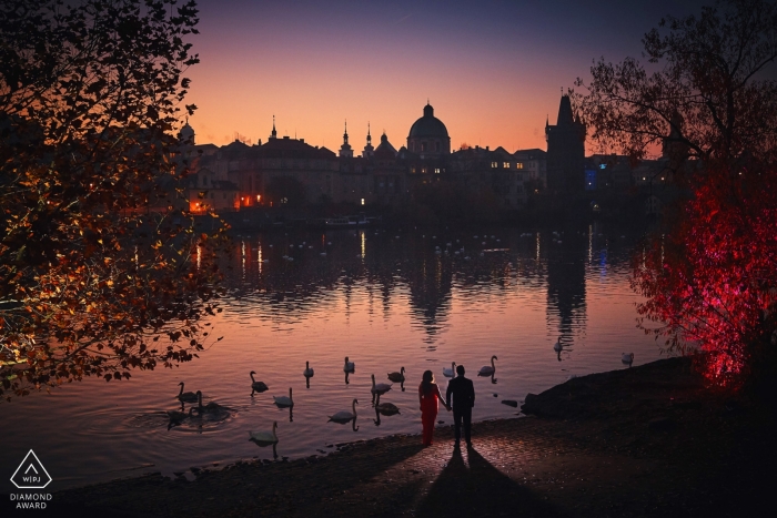 A couple by the riverside | artistic, creative, awesome engagement photos from Prague 