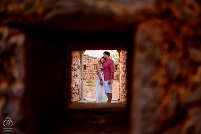 Photo by: <a href="https://www.wpja.com/photos/diamond-award-top-wedding-engagement-photographer/2330006">Corina Oghina - Brighton East Sussex Portrait of a couple hugging in Kefalonia Greece during e-session photography