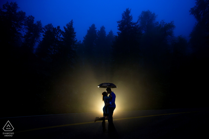 Photo by: <a href="https://www.wpja.com/photos/diamond-award-top-wedding-engagement-photographer/2343916">Justin Edmonds - Denver Colorado Lookout Mountain engagement photo session in the rain and fog