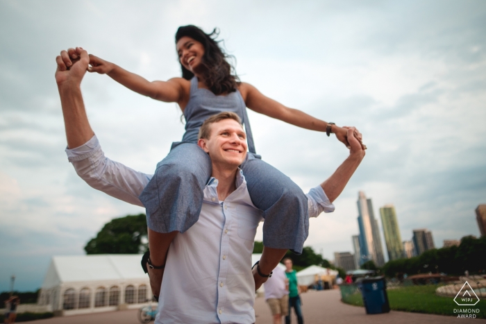 Washington DC pre-wedding picture on his shoulders On his shoulders | wedding photographer engagement portrait of a couple | Washington DC pre-wedding pictures