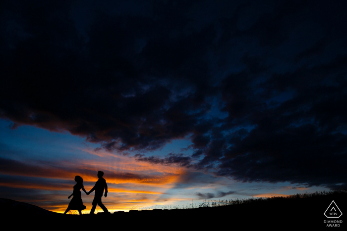 Photo by: <a href="https://www.wpja.com/photos/diamond-award-top-wedding-engagement-photographer/2343921">Justin Edmonds - Denver Colorado Rocky Mountain sunset engagement portrait session on Loveland Pass