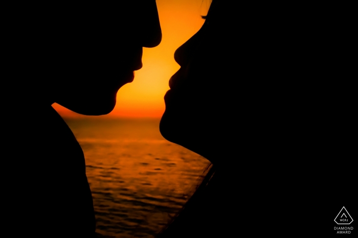 Liaoning China Engagement Photography at sunset with romantic couple about to kiss