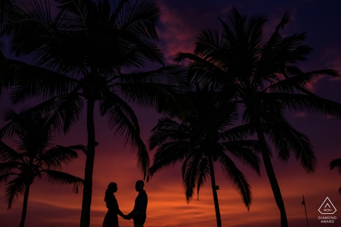 Photo by: <a href="https://www.wpja.com/photos/diamond-award-top-wedding-engagement-photographer/2347711">Sunny Pariani - Mumbai Maharashtra Prewedding engagement photography shoot in Goa with a red sky and dark palm trees