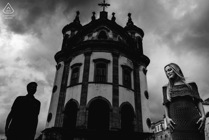 Photo by: <a href="https://www.wpja.com/photos/diamond-award-top-wedding-engagement-photographer/2361096">Vinicius Terror - Ouro Preto Minas Gerais A Minas Gerais engagement photo shoot session of a couple with tall buildings | Brazil photographer