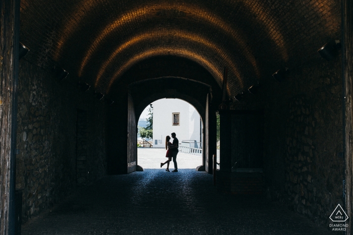 Slovakia wedding engagement photo of a couple in the arched tunnel Slovakia wedding engagement photographers | pre-wedding photography