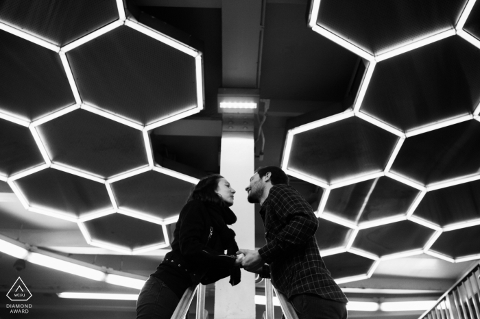 A Florida couple illuminated by the honeycomb pattern above