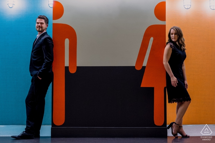 In Atlanta, Georgia, a couple posed in front of the entrance to the public restrooms