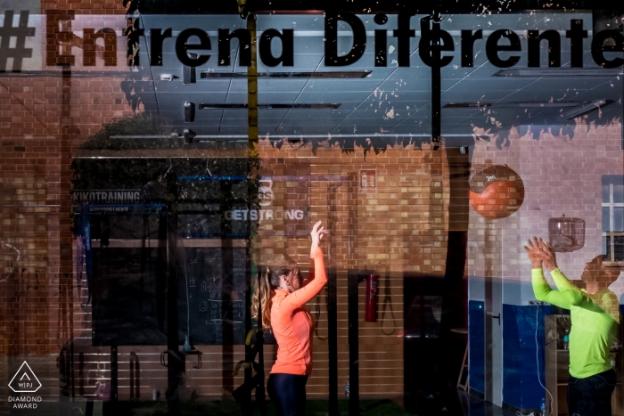 The Alicante couple's intense workout captured through the gym glass window 