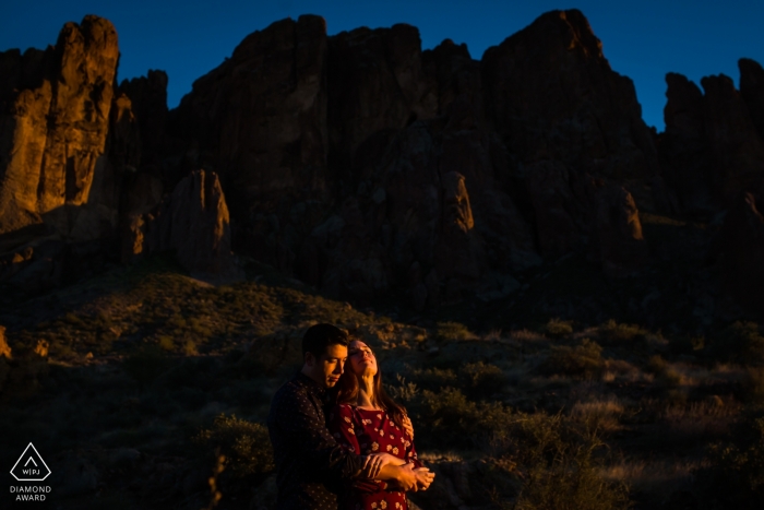 An Arizona engaged couple is basking in a warm sunset sun