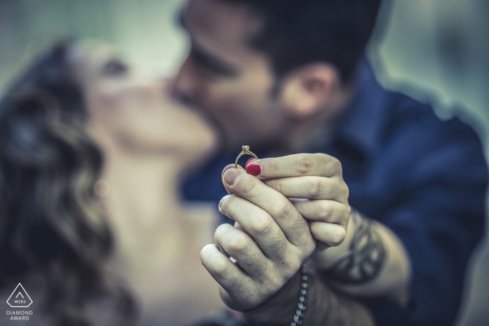 The happy La Spezia couple with a soft focus on their kiss