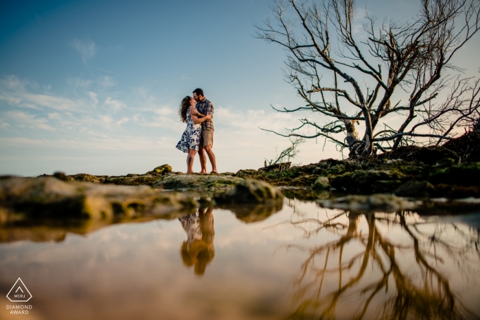 Photo by: <a href="https://www.wpja.com/photos/diamond-award-top-wedding-engagement-photographer/2422551">Michael Freas - Key West Florida Scout Key, Florida reflection shot of an engaged couple in a tidal pool